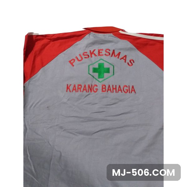 Seragam Olahraga Puskesmas Karang Bahagia Seragam Olahraga Puskesmas Karang Bahagia, kaos olahraga raglan abu kombinasi merah dengan sablon logo dan tulisan Puskesmas Karang Bahagia di punggung